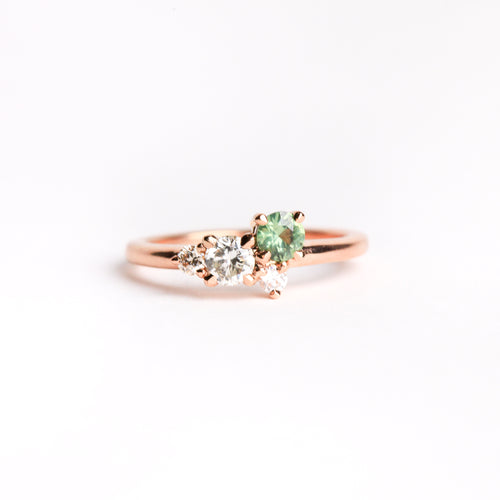 Ethically sourced ethically sourced Australian green sapphire with white and champagne diamond ring with recycled refined 18ct Rose Gold. Bespoke and Handmade by Black Finch Jewellery in Melbourne