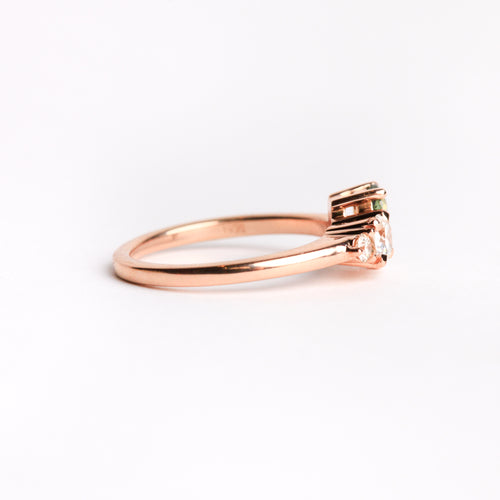 Ethically sourced ethically sourced Australian green sapphire with white and champagne diamond ring with recycled refined 18ct Rose Gold. Bespoke and Handmade by Black Finch Jewellery in Melbourne