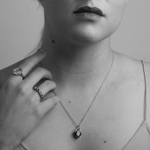 Made in Melbourne, bespoke 9ct yellow gold garnet heart pendant necklace on 9ct gold chain. Worn by model.