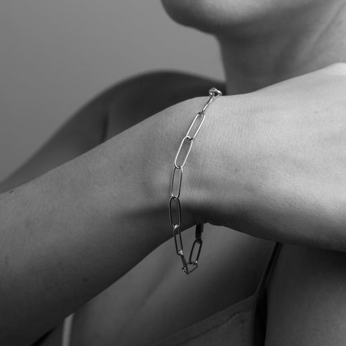 Elongated gold chain bracelet made by Black Finch Jewellery in Melbourne. Shown on model