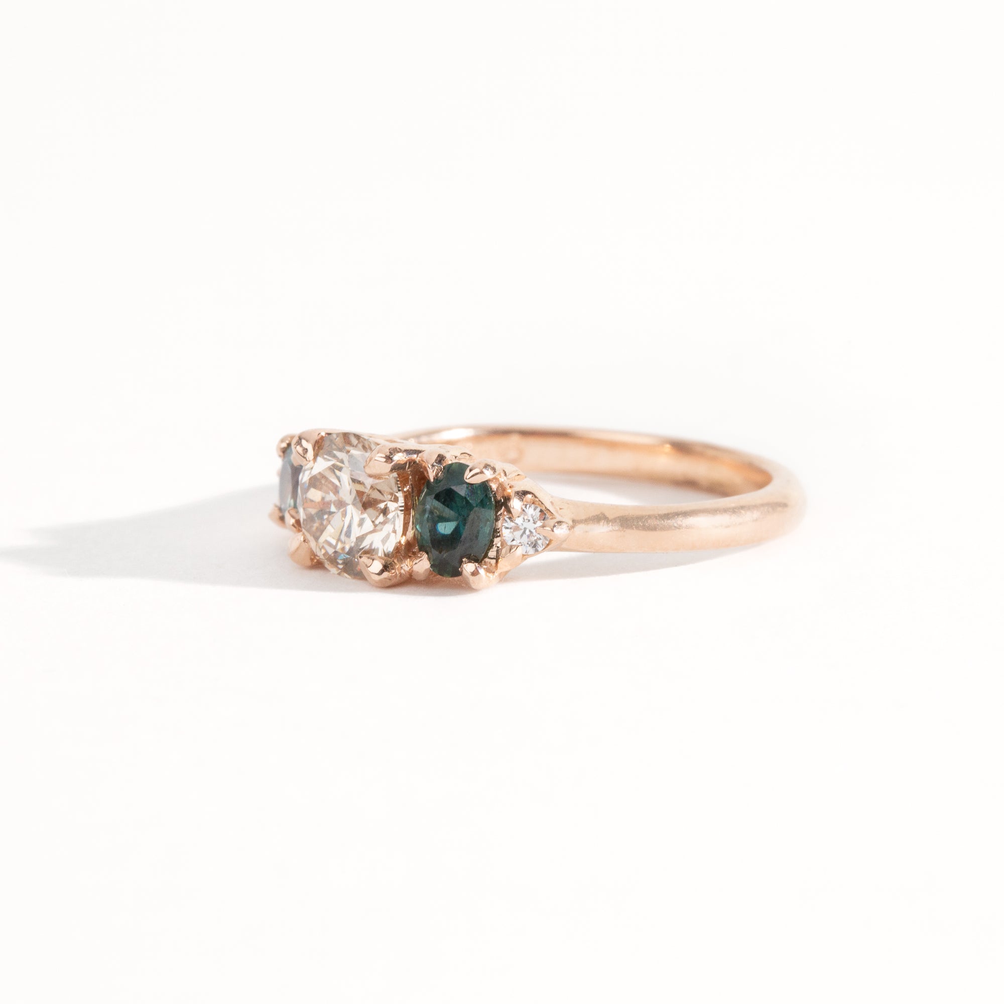 Handmade, bespoke Diamond and ethically sourced Australian sapphire five stone cluster ring in 14ct recycled refined rose gold