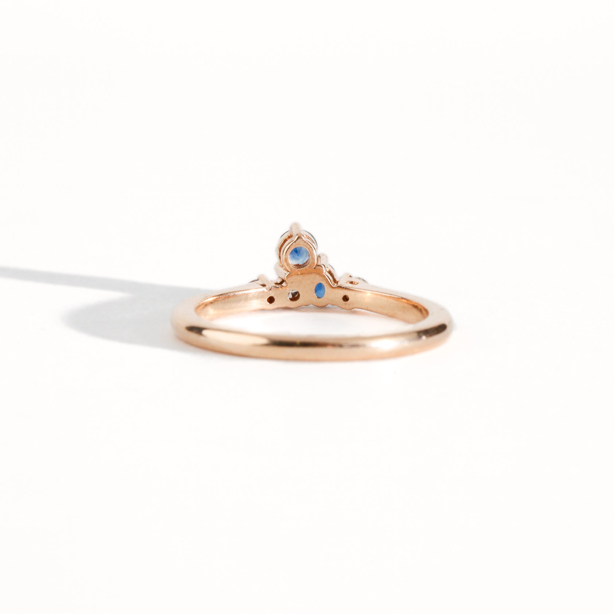 Ethically sourced blue Australian Sapphires and White and Champagne Diamond Ring with Recycled Refined 18ct Rose Gold. Bespoke and Handmade by Black Finch Jewellery in Melbourne