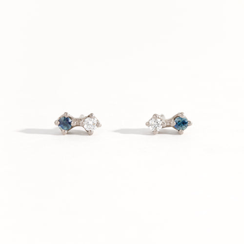 Paid of white gold studs featuring white diamond and Australian blue sapphires. Bespoke, handmade jewellery.