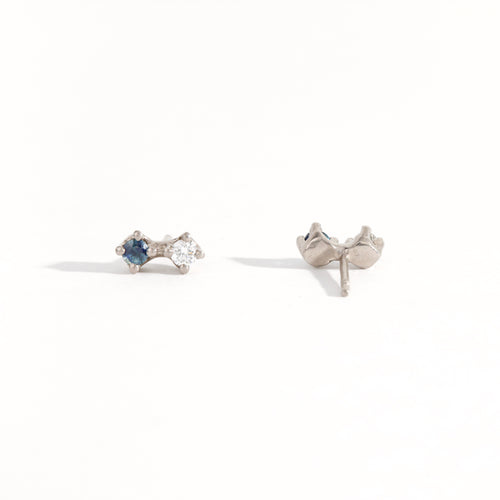 Paid of white gold studs featuring white diamond and Australian blue sapphires. Bespoke, handmade jewellery.