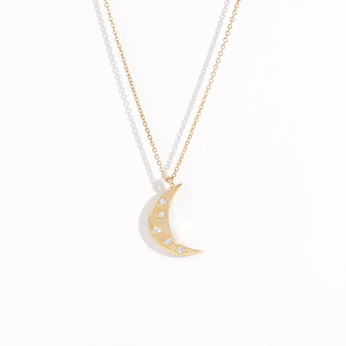 Made in Melbourne crescent moon pendant in 9ct yellow gold with diamonds star set. 