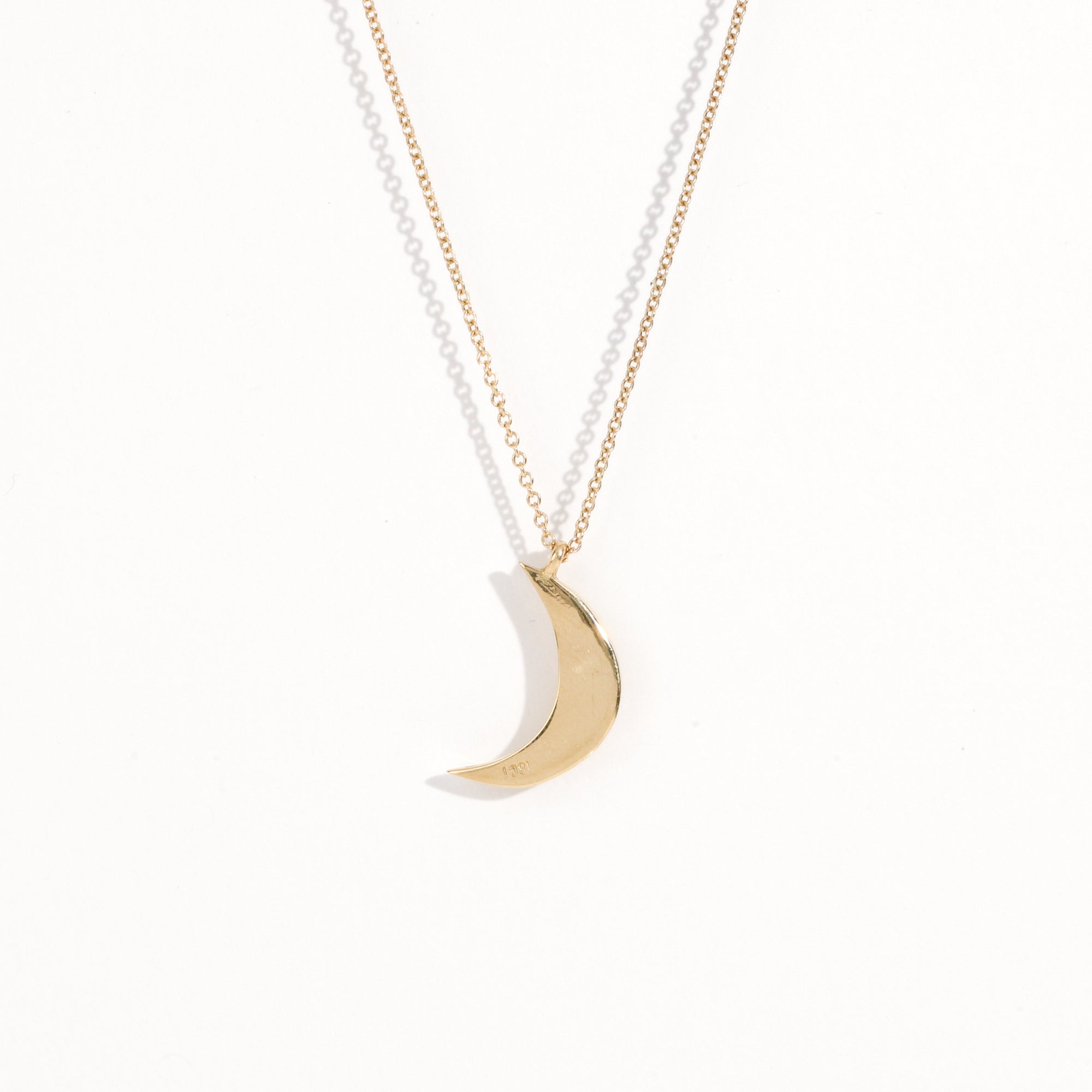 Made in Melbourne crescent moon pendant in 9ct yellow gold with diamonds star set. 