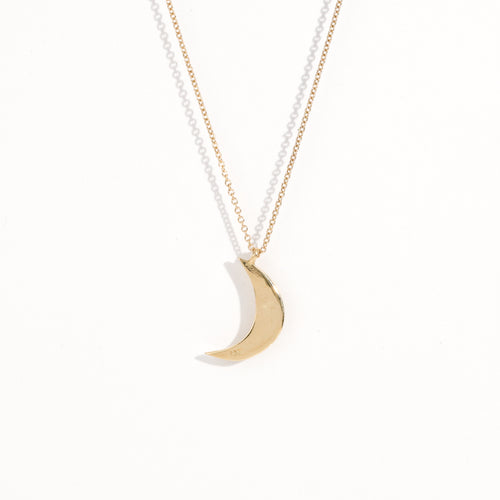Made in Melbourne crescent moon pendant in 9ct yellow gold with diamonds star set. 