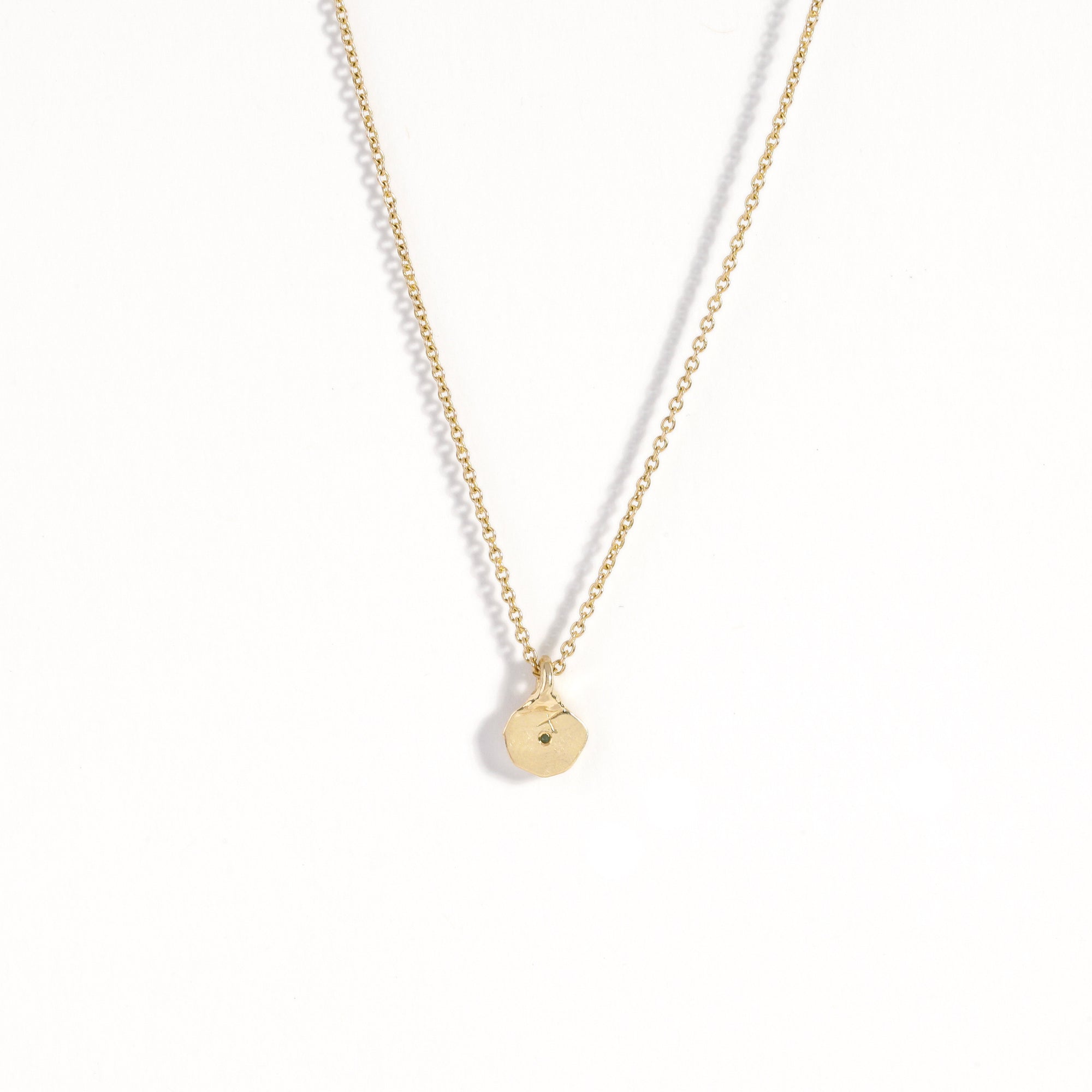 Dainty pendant crafted in 9ct yellow gold with recycled, refined gold. Featuring an ethically sourced Australian teal sapphire on an 9ct gold chain.