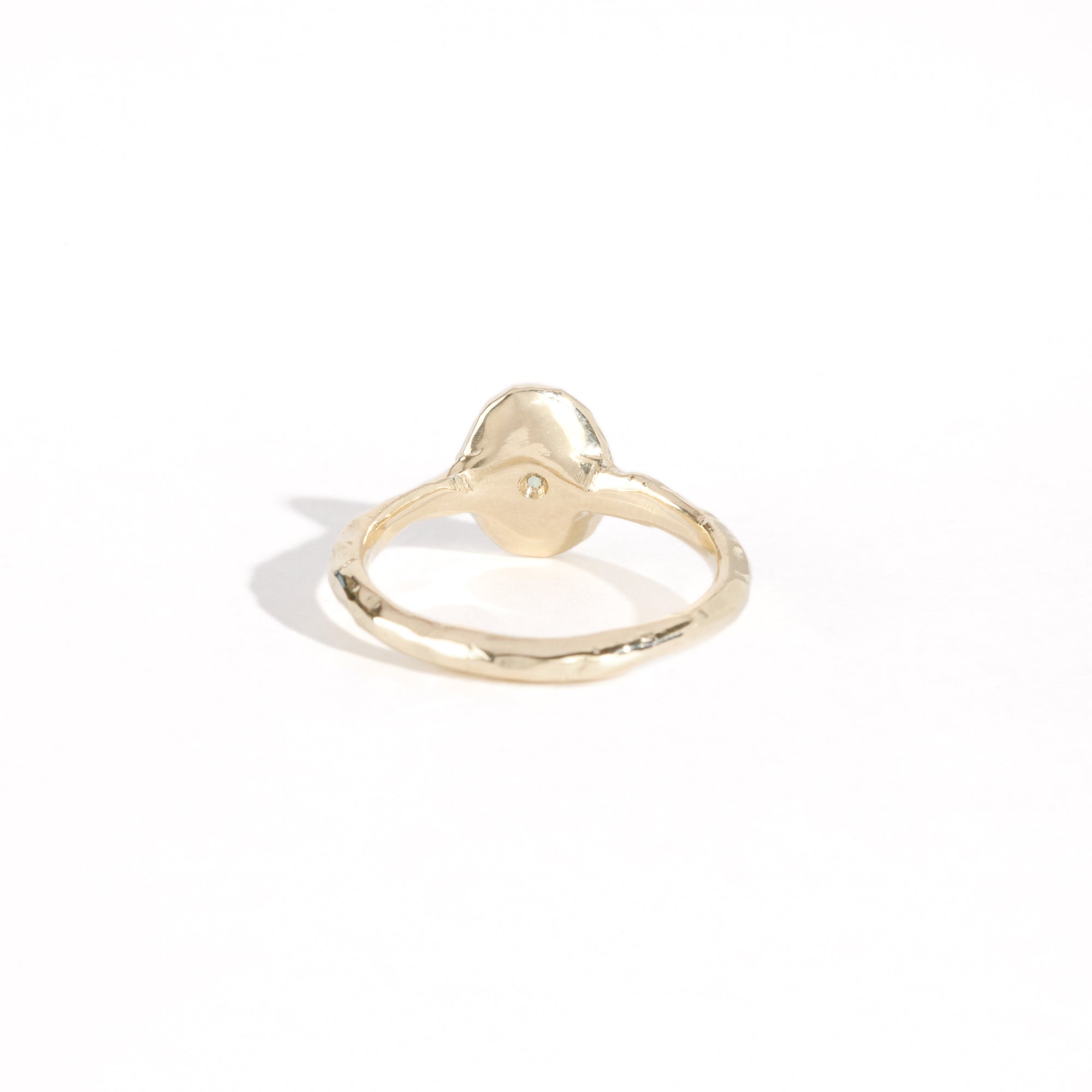 9ct yellow gold signet ring with star set sea-foam coloured sapphire in centre. Bespoke and handmade in Melbourne by Black Finch Jewellery
