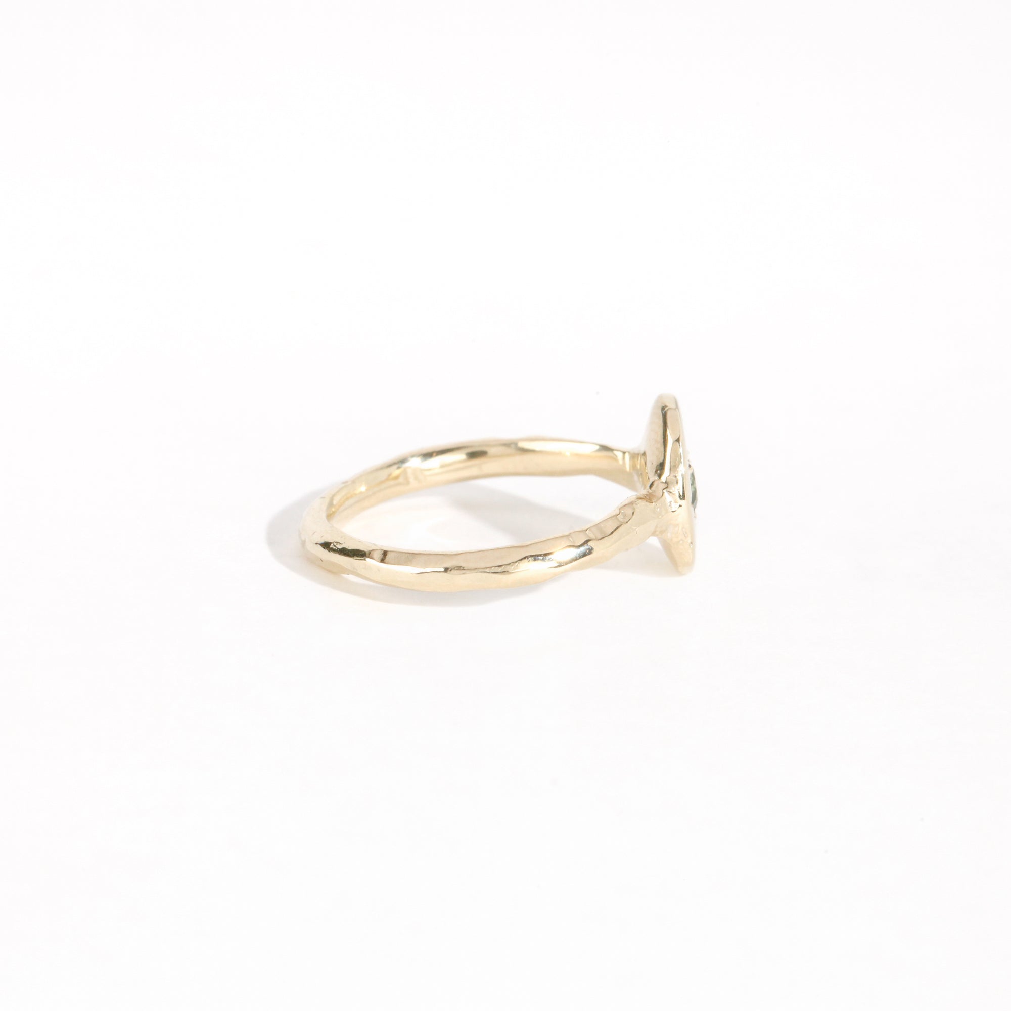 9ct yellow gold signet ring with star set sea-foam coloured sapphire in centre. Bespoke and handmade in Melbourne by Black Finch Jewellery