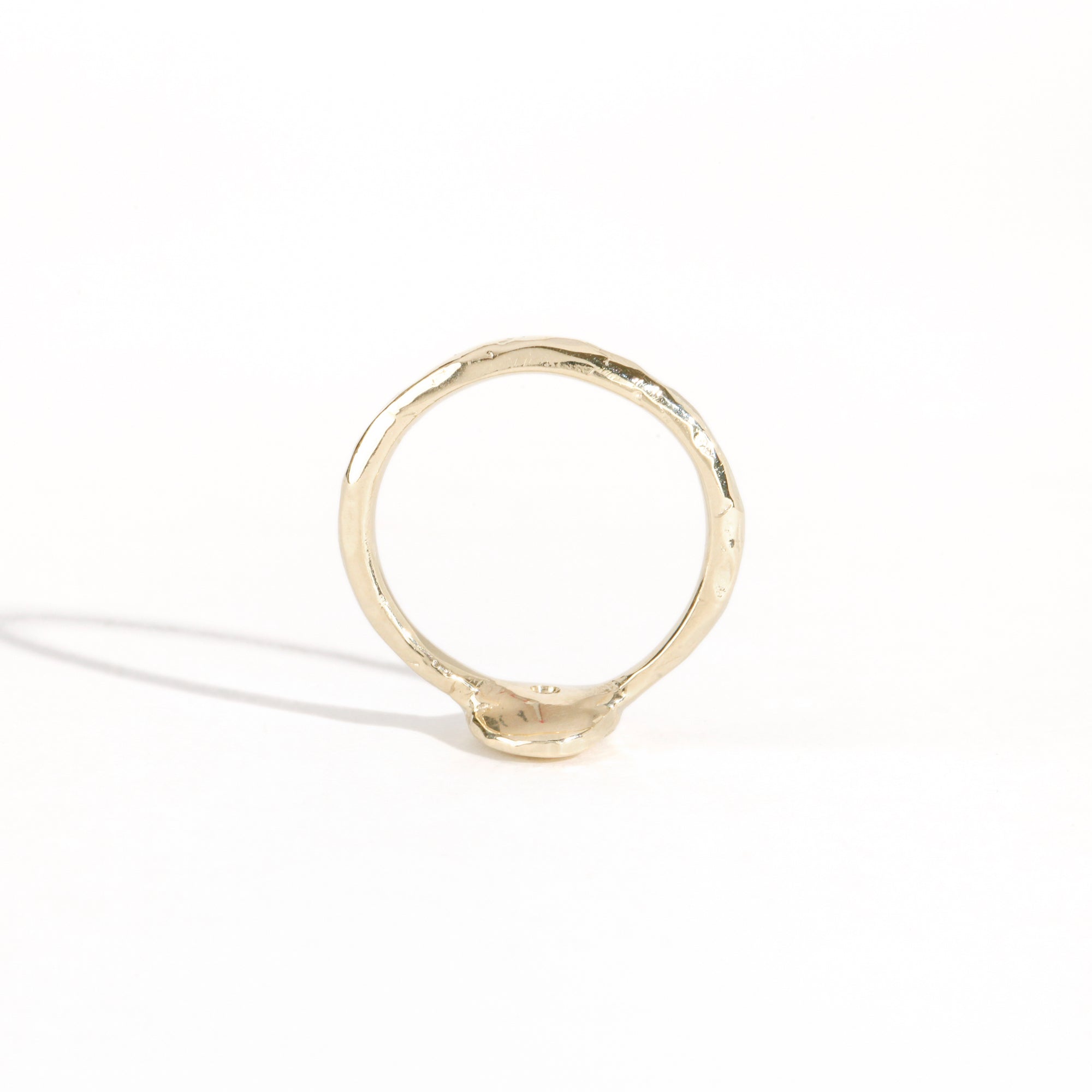 9ct yellow gold signet ring with star set sea-foam coloured sapphire in centre. Bespoke and handmade in Melbourne by Black Finch Jewellery