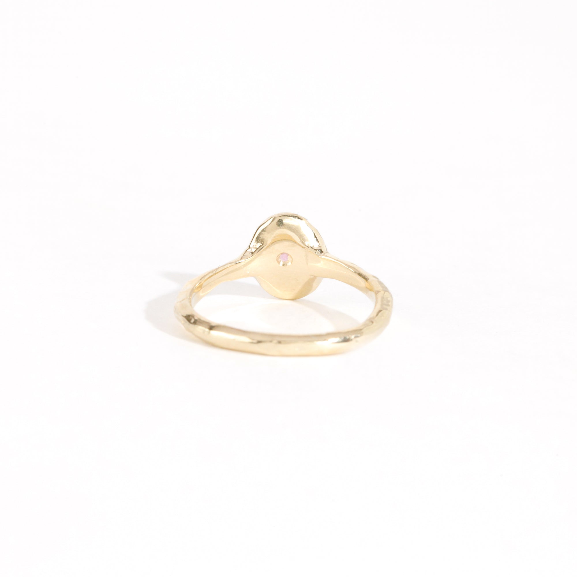 9ct yellow gold signet ring with star set pink sapphire in centre. Bespoke and handmade in Melbourne by Black Finch Jewellery