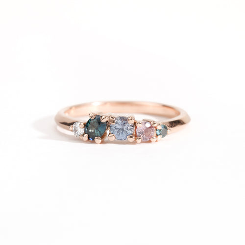 18ct Rose Gold ring set with ethically sourced Australian sapphires in blues and pink hues and a white diamond. Handmade by Black Finch Jewellery Melbourne