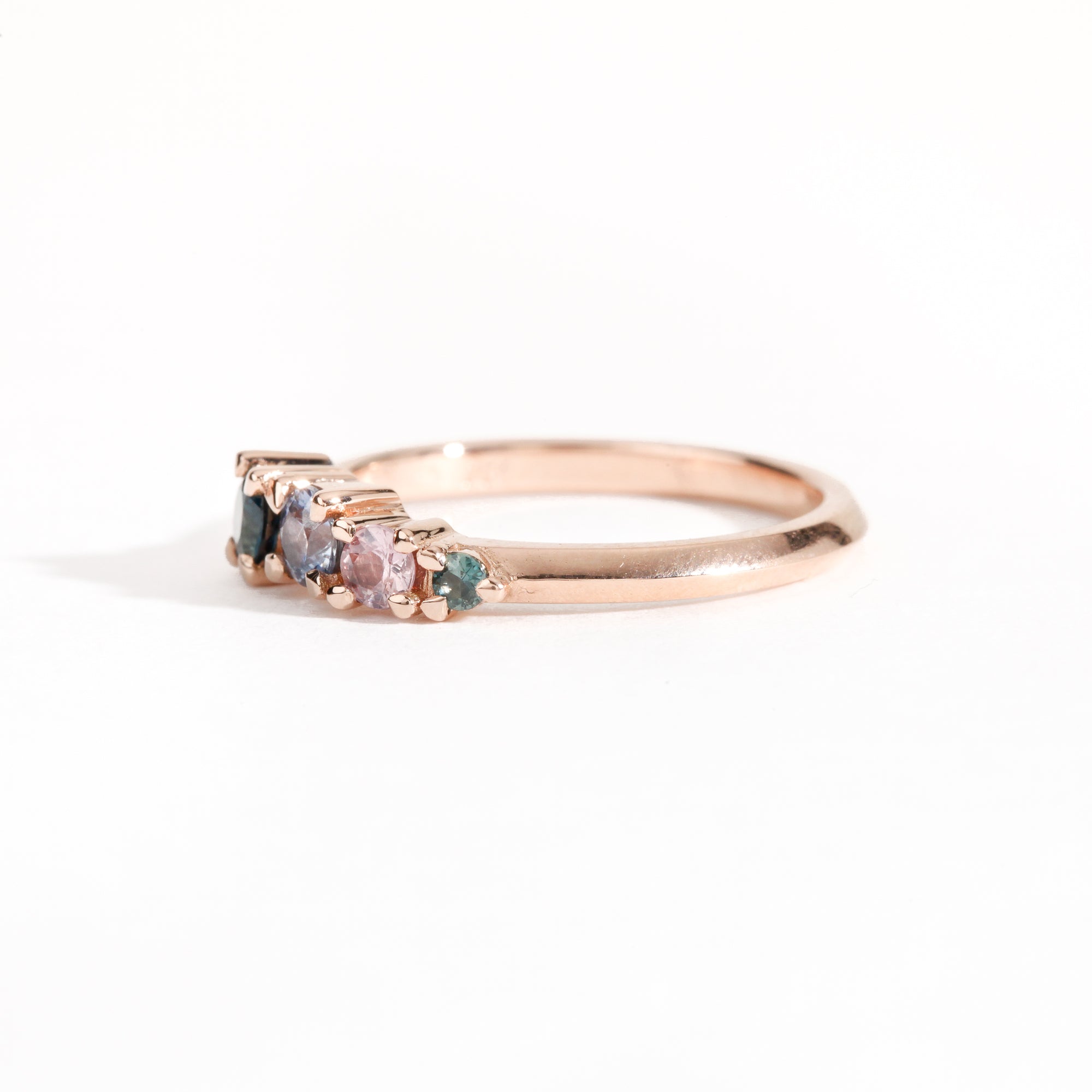 18ct Rose Gold ring set with ethically sourced Australian sapphires in blues and pink hues and a white diamond. Handmade by Black Finch Jewellery Melbourne