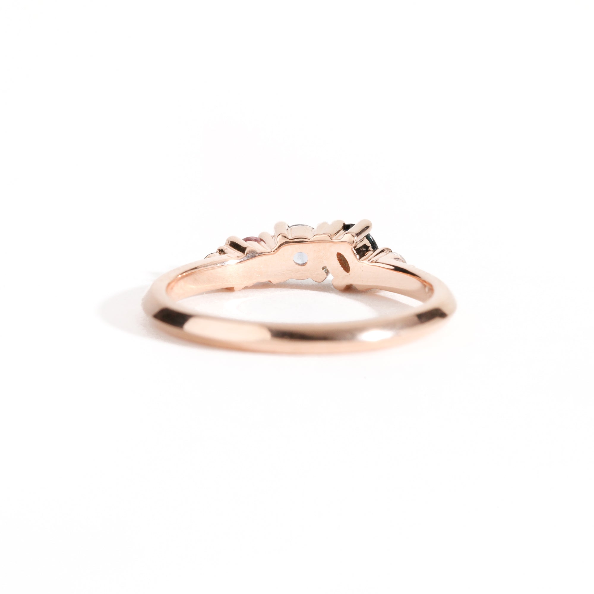 18ct Rose Gold ring set with ethically sourced Australian sapphires in blues and pink hues and a white diamond. Handmade by Black Finch Jewellery Melbourne