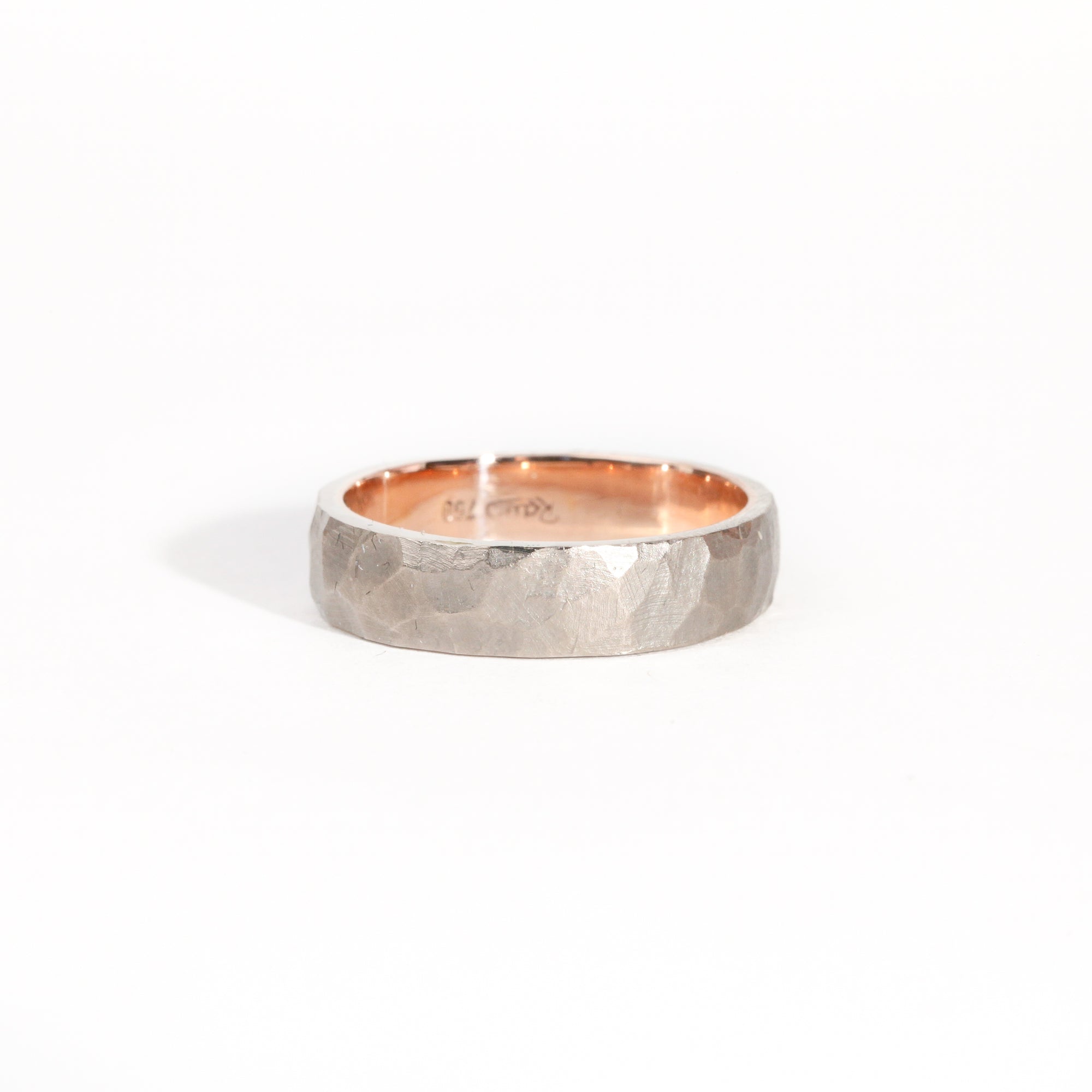 Hand finished 18ct rose gold sleeve with 18ct white gold exterior.