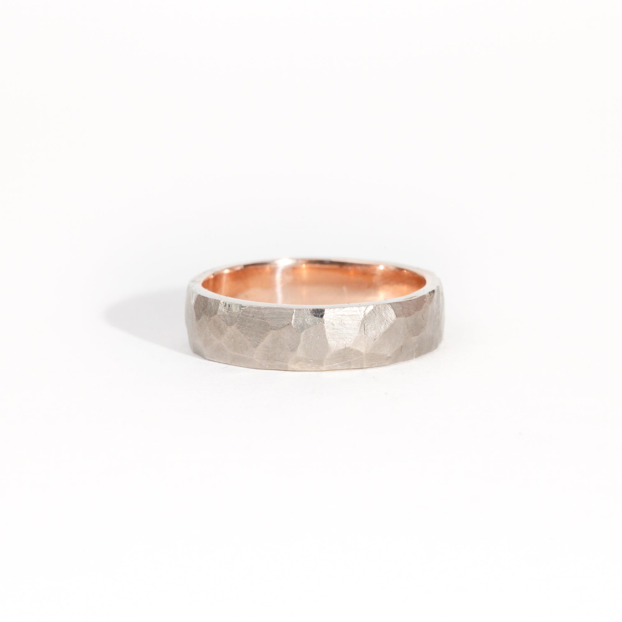 Hand finished 18ct rose gold sleeve with 18ct white gold exterior.