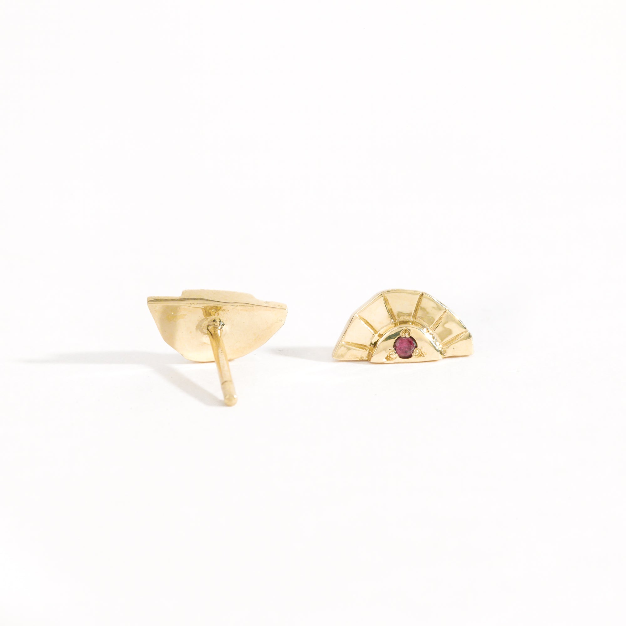 Rising sun earrings with centre red sapphire crafted in 9ct yellow gold by Black Finch Jewellery