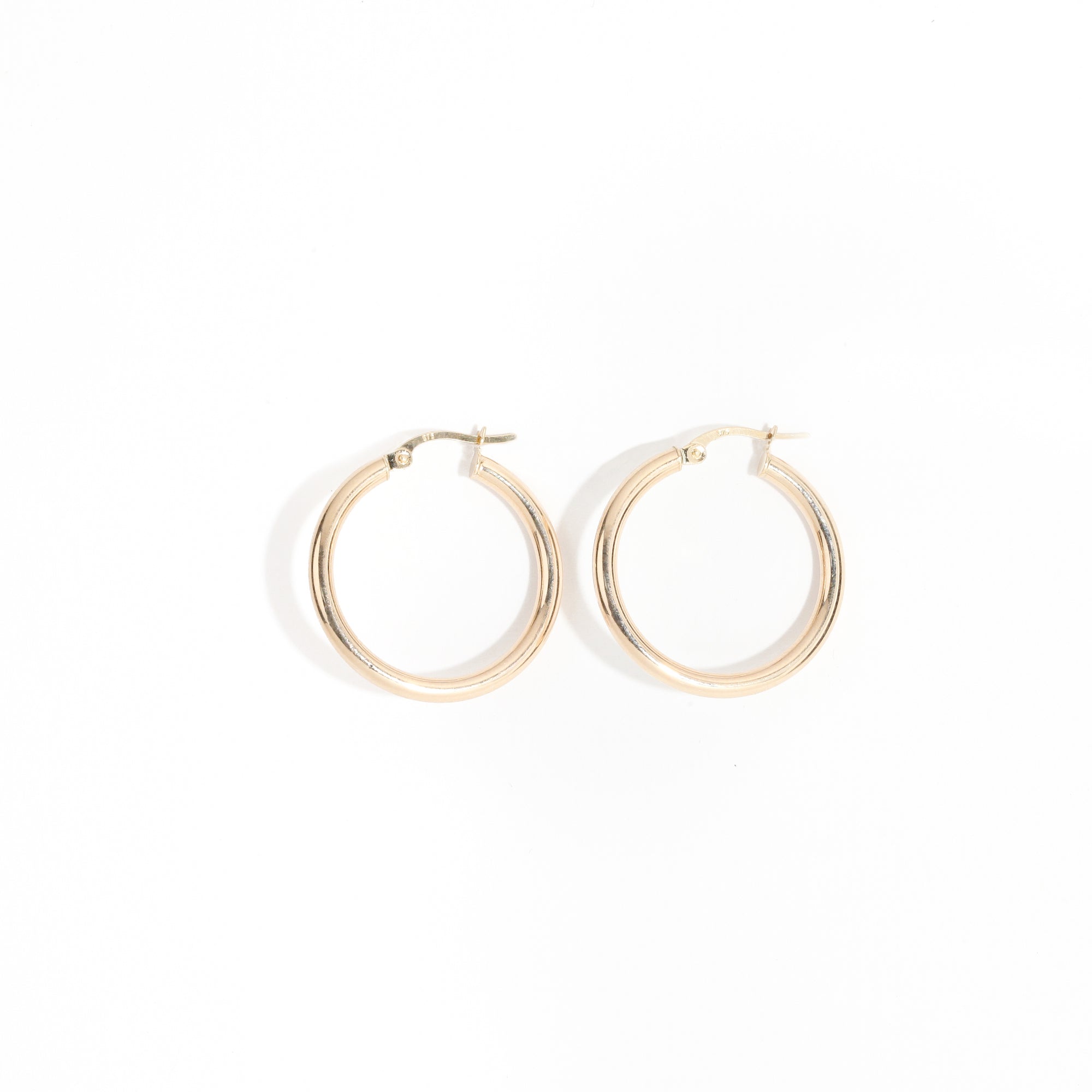 Classic 9 carat yellow gold hoops. 