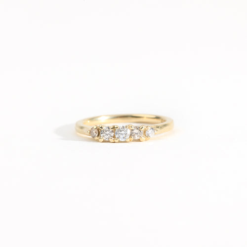 Hand crafted yellow gold five stone champagne diamond ring. 