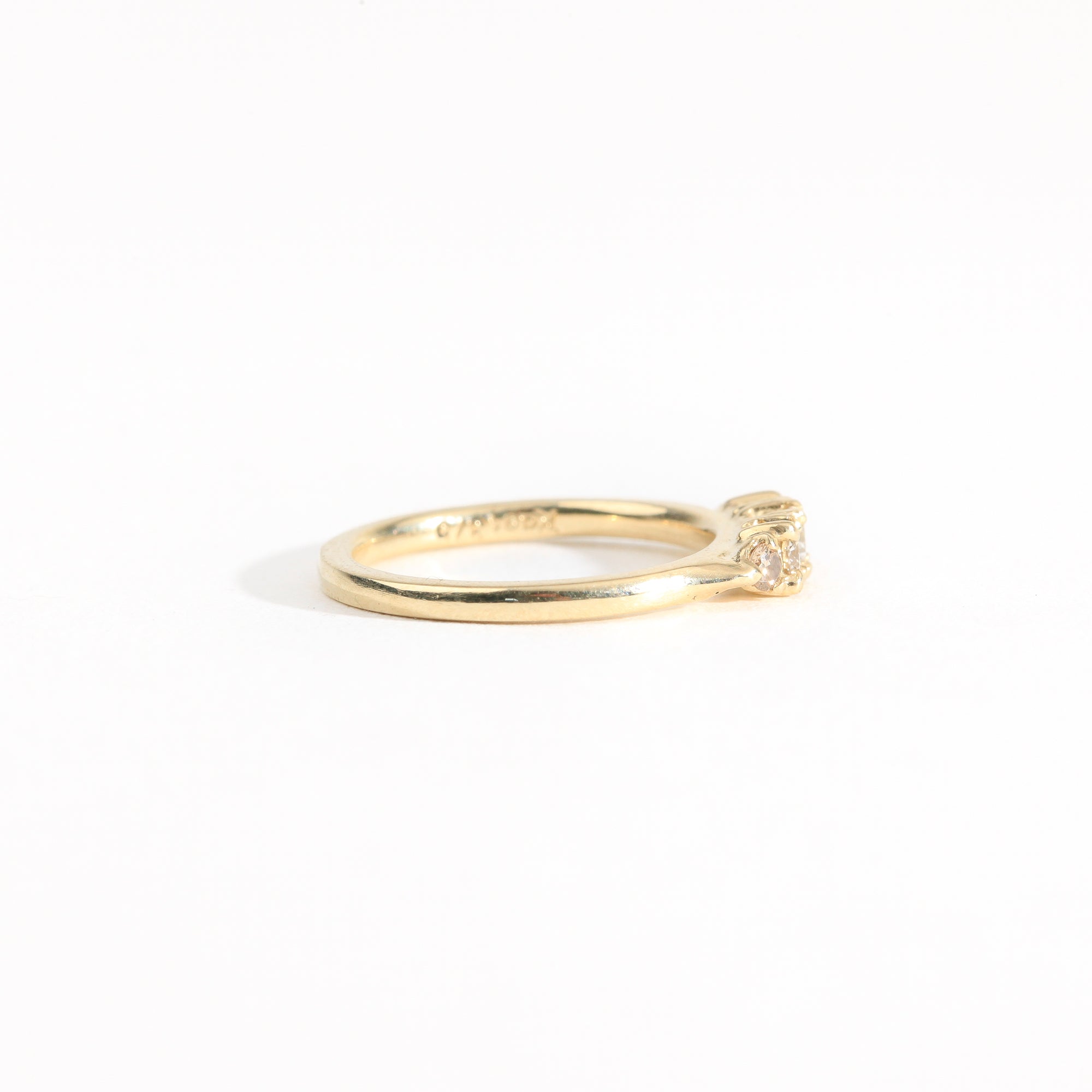 Hand crafted yellow gold five stone champagne diamond ring. 