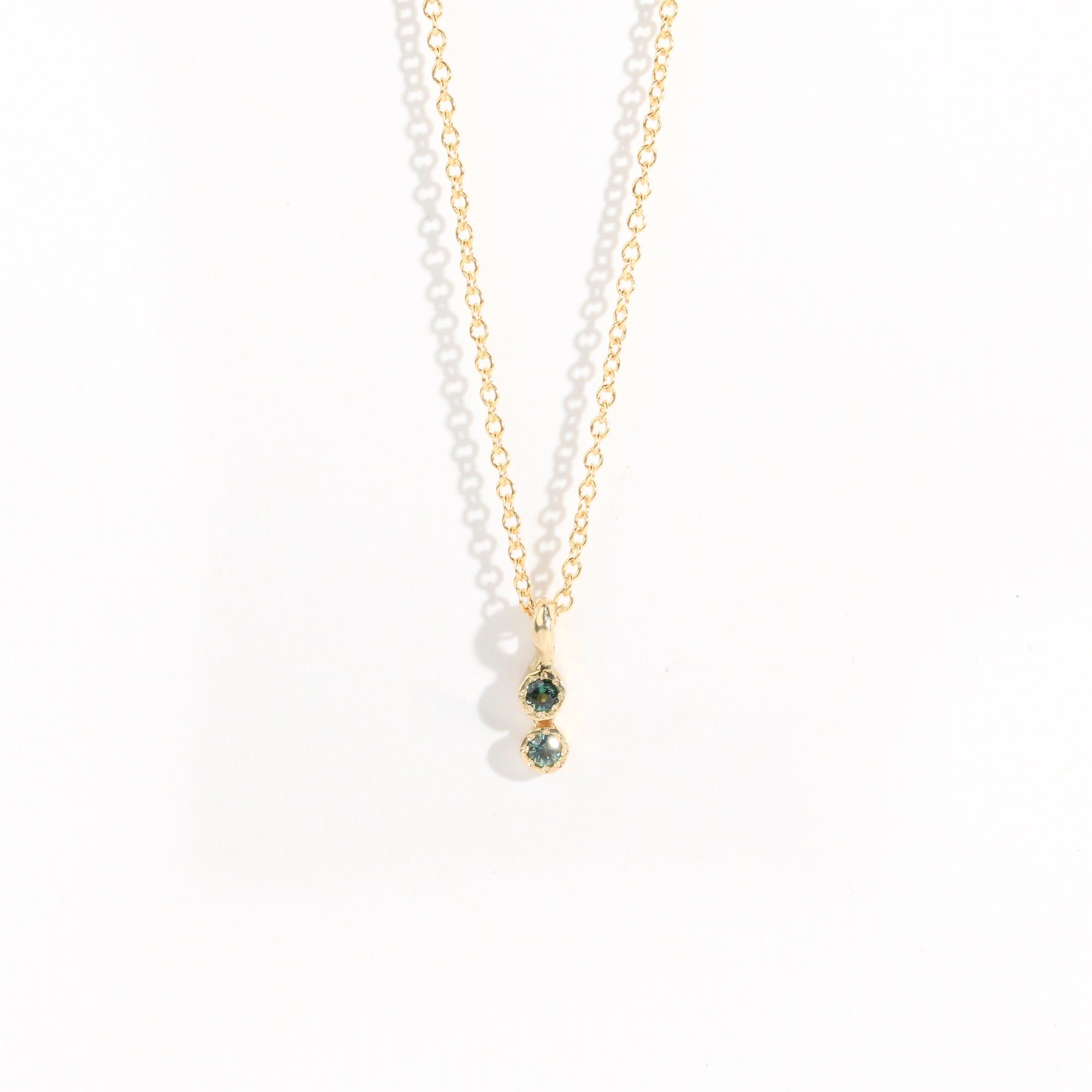 Petite two stone pendant with ethically sourced Australian sapphires crafted in yellow gold by Black Finch