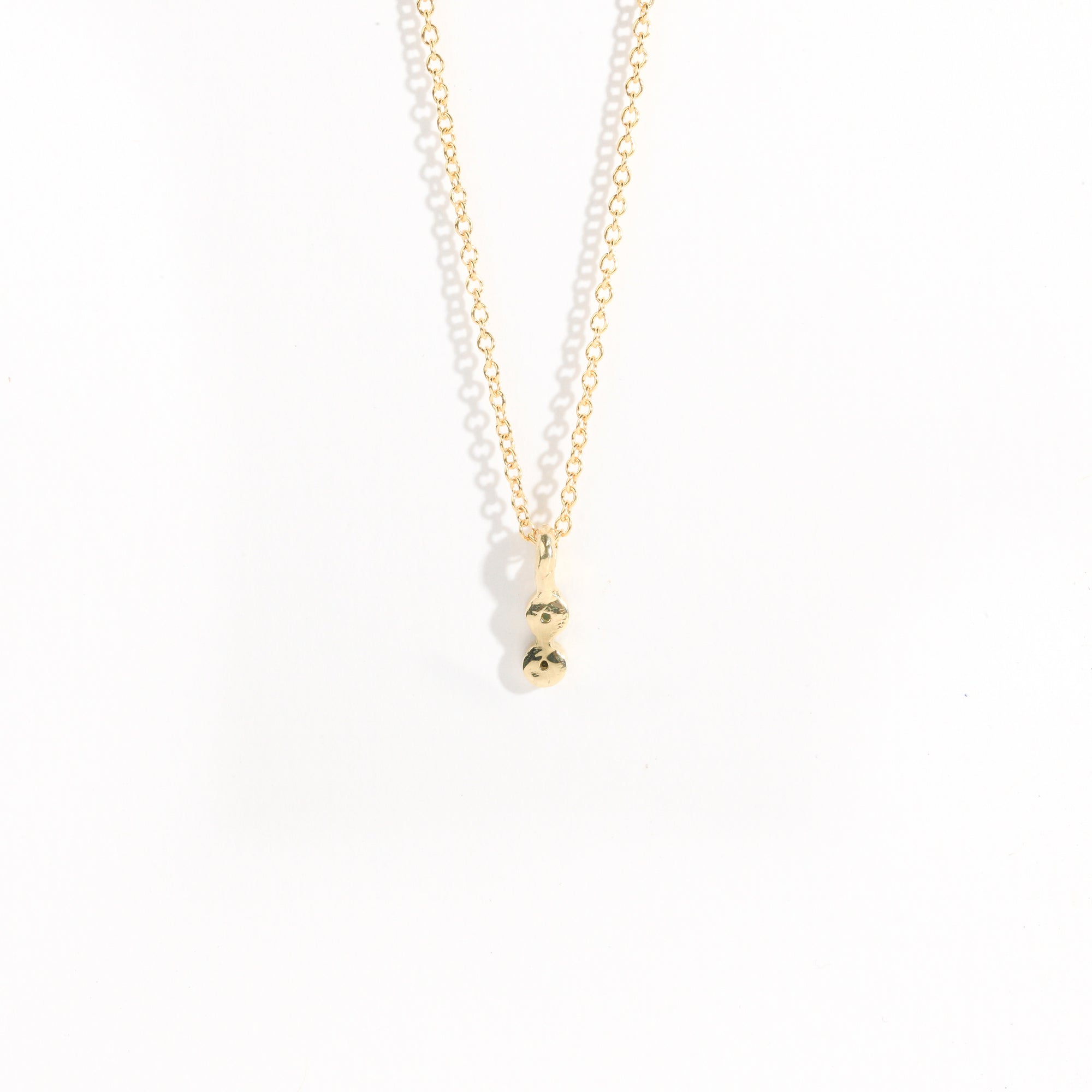 Petite two stone pendant with ethically sourced Australian sapphires crafted in yellow gold by Black Finch