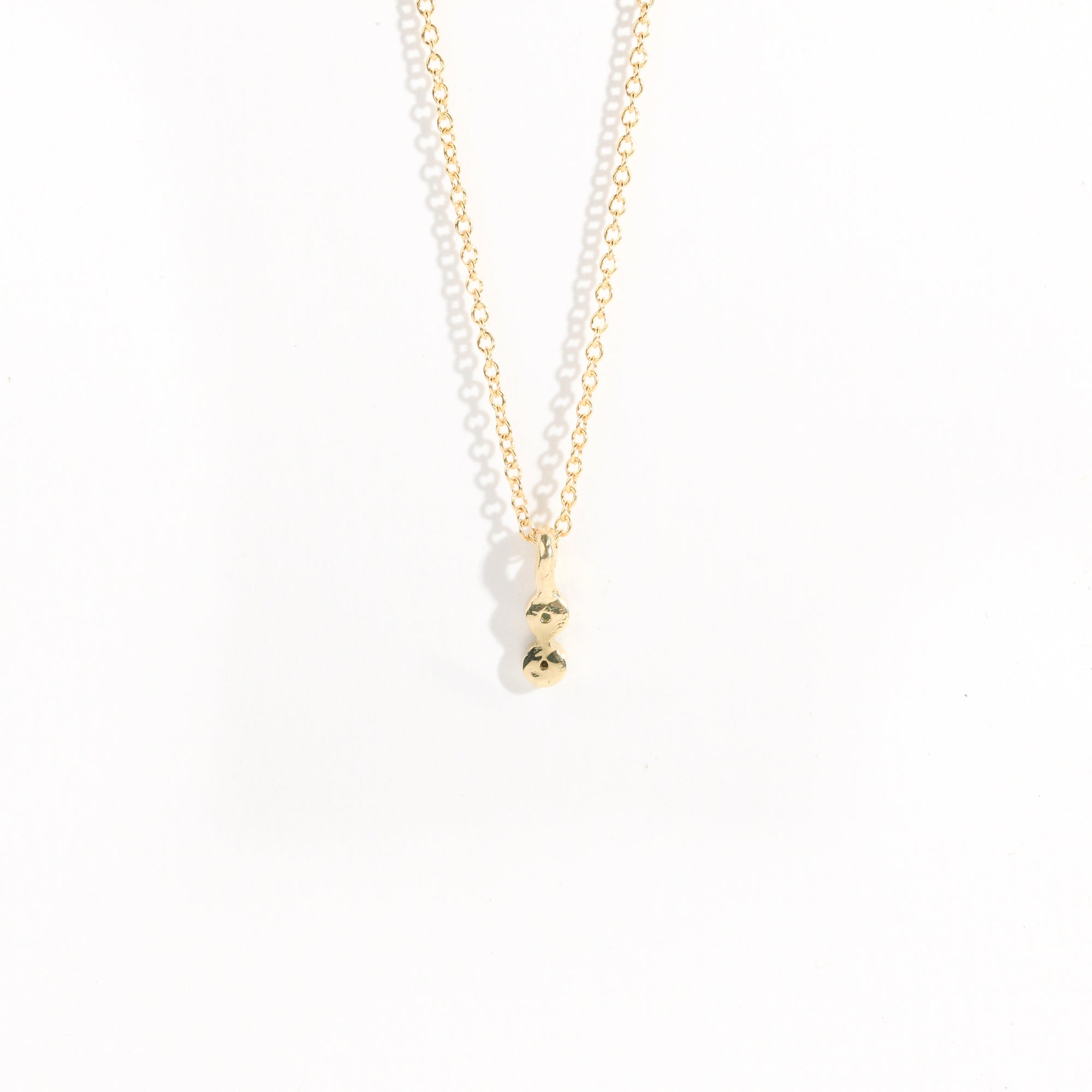 Petite two stone pendant with ethically sourced Australian sapphires crafted in yellow gold by Black Finch