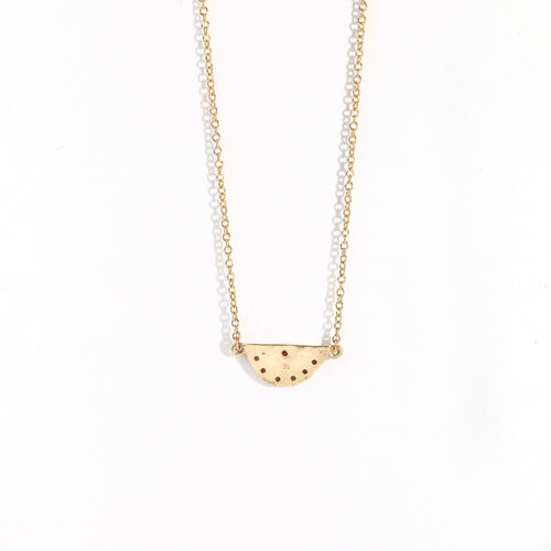 9ct yellow gold pendant rising sun detailed with red and pink sapphires by Black Finch Jewellery
