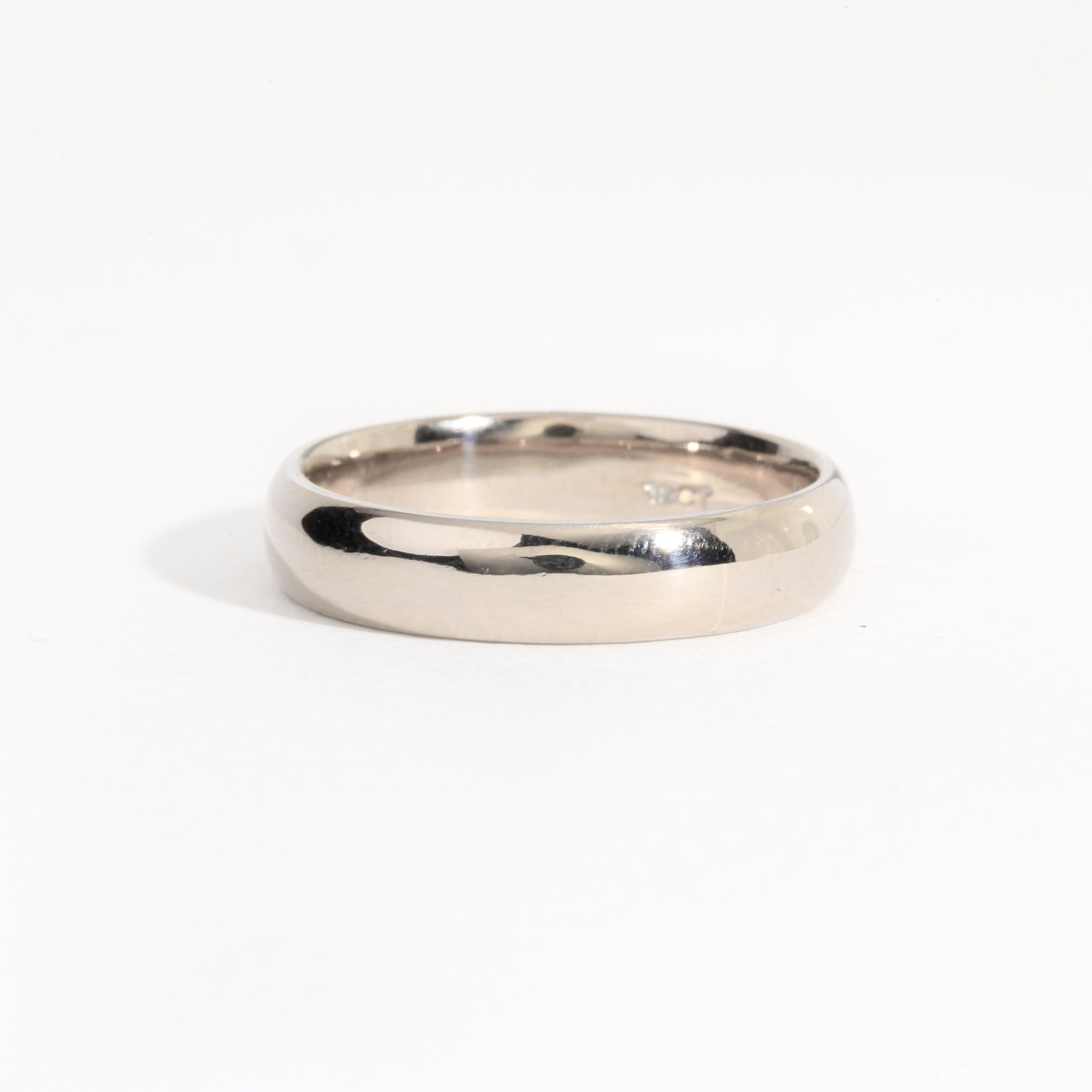 Classic platinum wedding band with polished finish, Men's wedding band 18ct yellow, white and rose gold. Custom bespoke handmade jewellery.