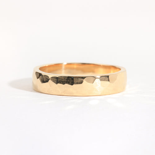 Men's wedding band in 18ct yellow gold with a soft chiseled finish, Custom bespoke handmade jewellery.