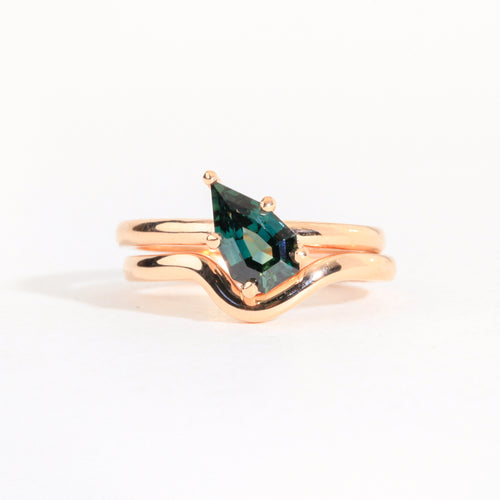 Handmade 18 carat rose gold dimpled band, perfectly curved to wear alongside a green sapphire solitaire engagement ring. 