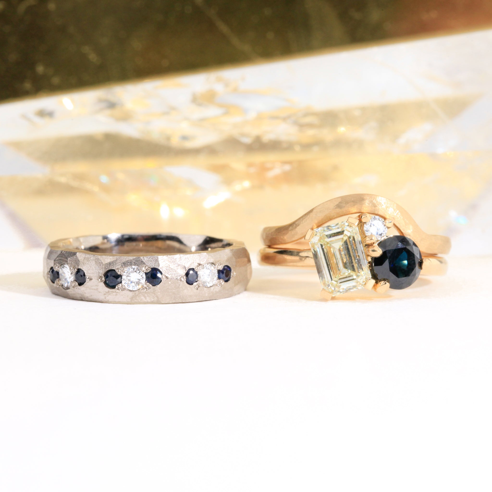 Hammered 18 carat white gold men's wedding band, set with ethically sourced Australian sapphires and conflict free diamonds.