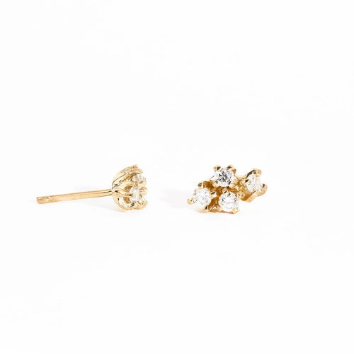 Pair of gold studs featuring four mixed white diamonds. Bespoke and handmade in Melbourne by Black Finch Jewellery.