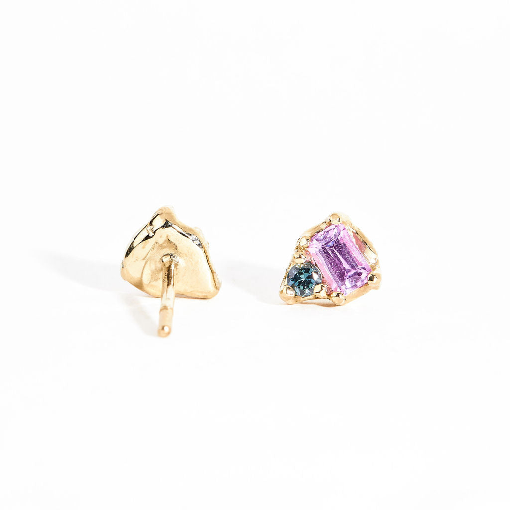 Two stone earrings with emerald cut pink sapphires and ethically sourced blue Australian sapphires crafted in 9ct yellow gold by Black Finch Jewelley