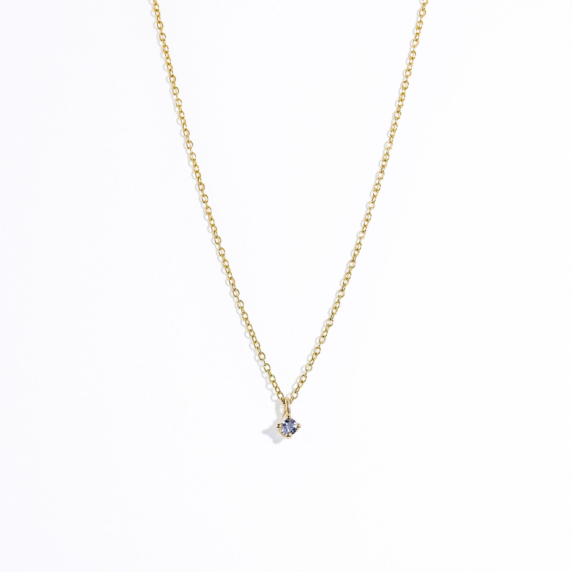 Single stone lilac Ceylon sapphire in claw setting 9ct yellow on chain. Hand made by Black Finch in Melbourne