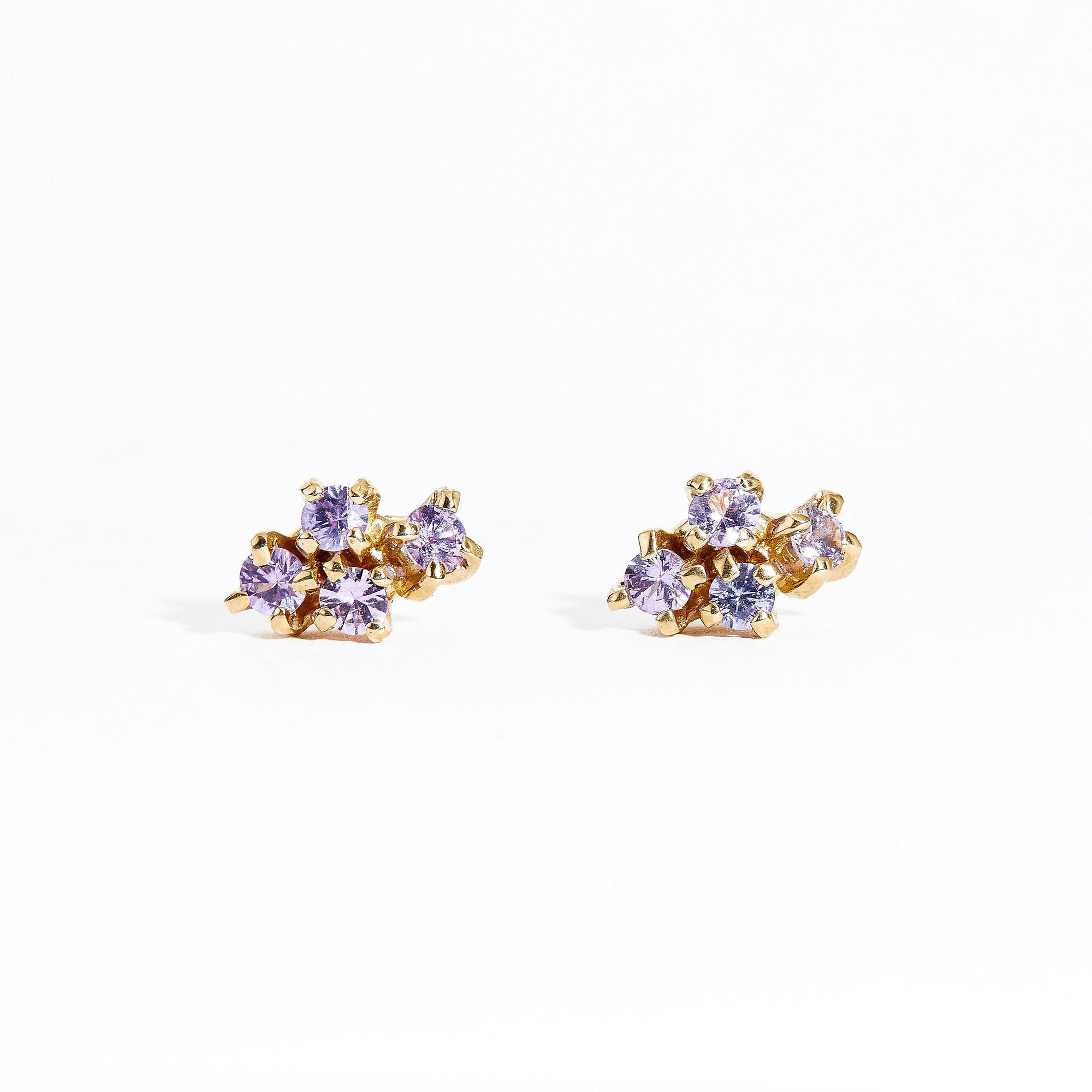  Pair of gold studs featuring four lilac sapphires. Bespoke and handmade in Melbourne by Black Finch Jewellery.