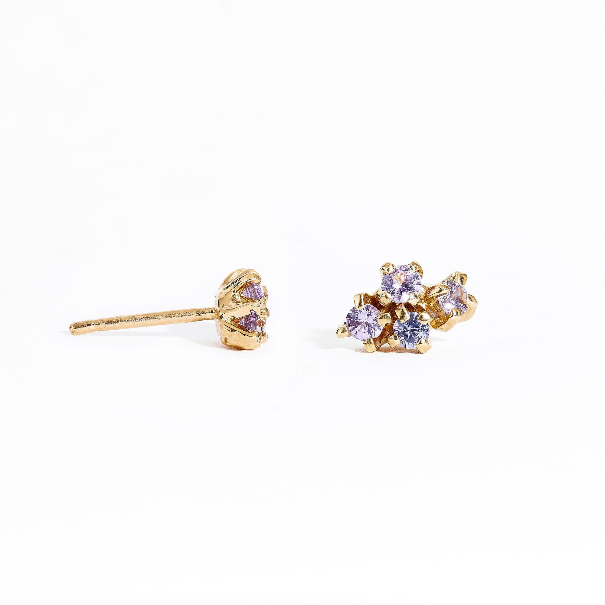  Pair of gold studs featuring four lilac sapphires. Bespoke and handmade in Melbourne by Black Finch Jewellery.