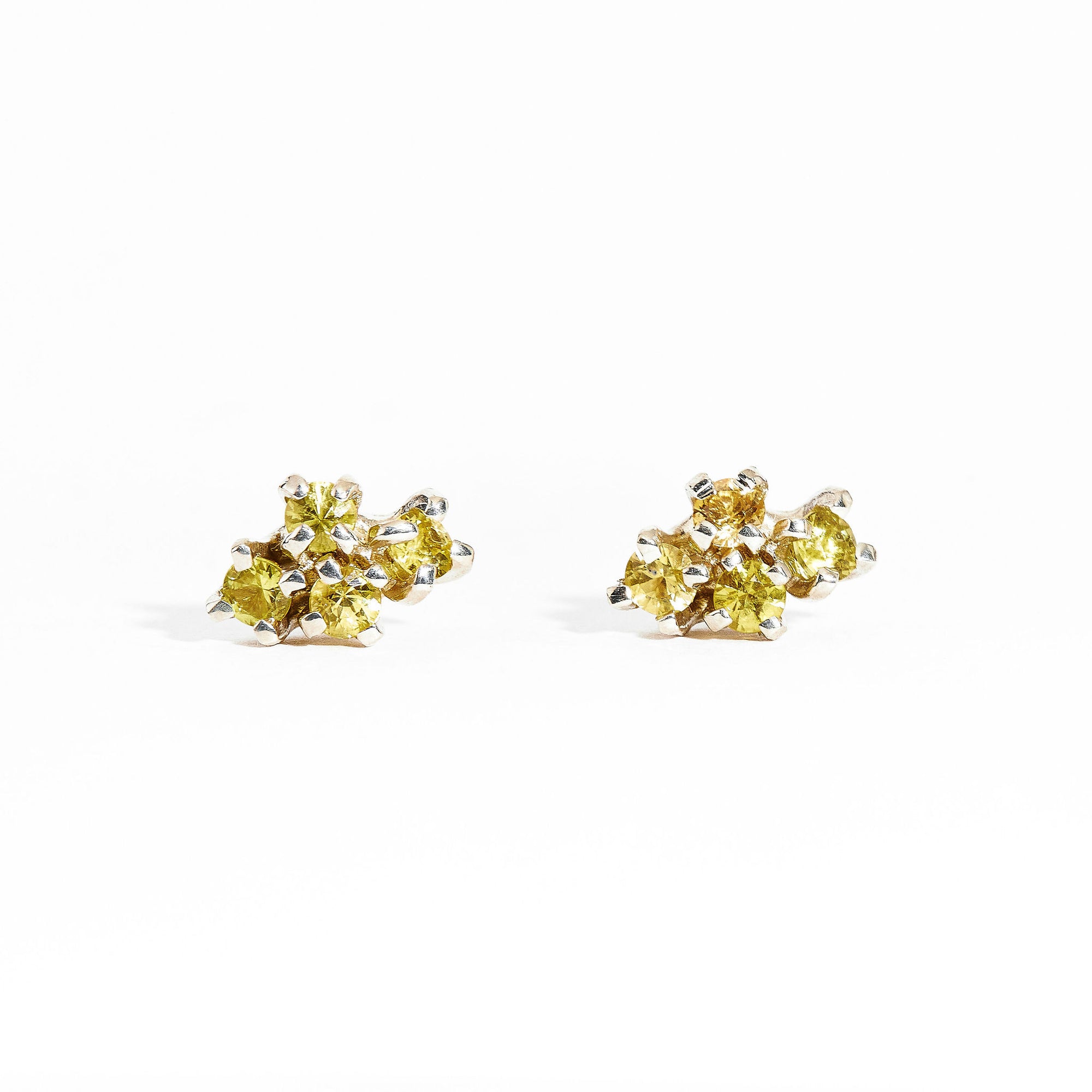 Pair of gold studs featuring four yellow sapphires. Bespoke and handmade in Melbourne by Black Finch Jewellery.