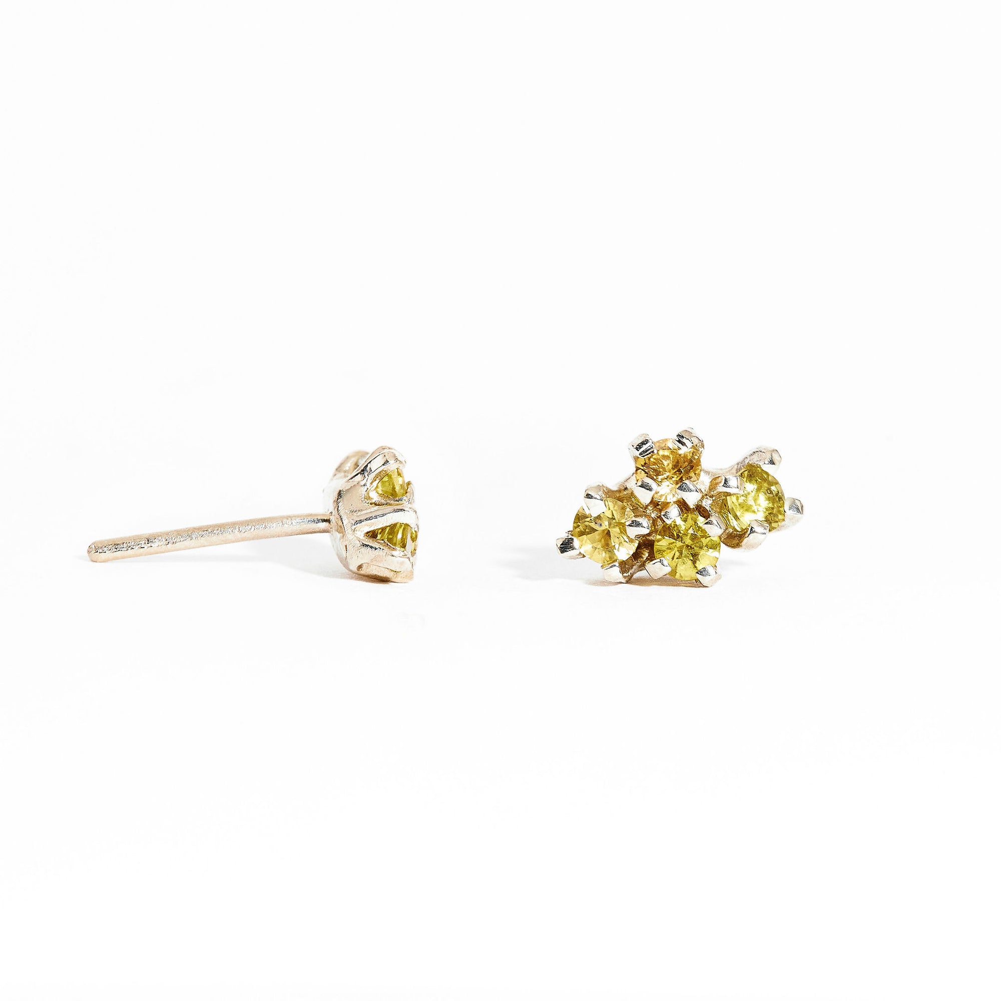 Pair of gold studs featuring four yellow sapphires. Bespoke and handmade in Melbourne by Black Finch Jewellery.