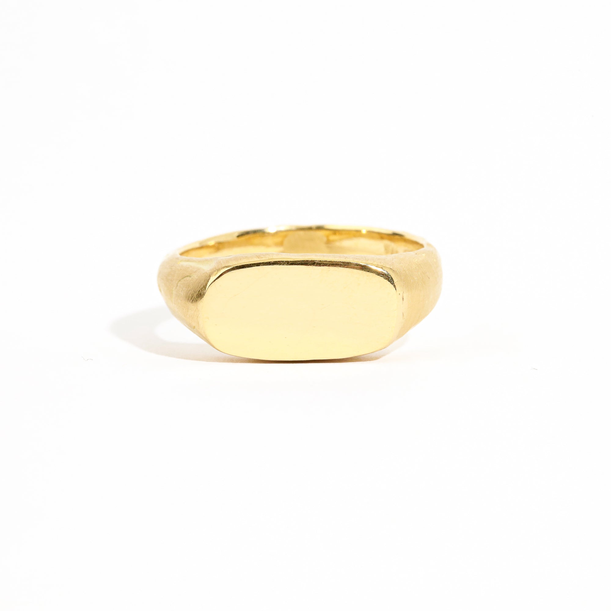 18 carat yellow gold signet, with a polished surface and soft matte band.