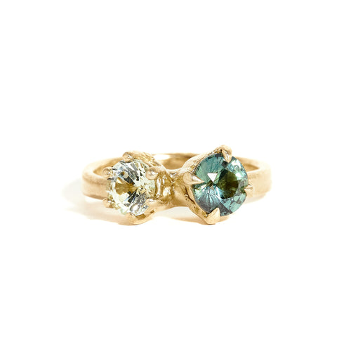 Two stone sapphire ring with light green and teal sapphires in 9ct yellow gold