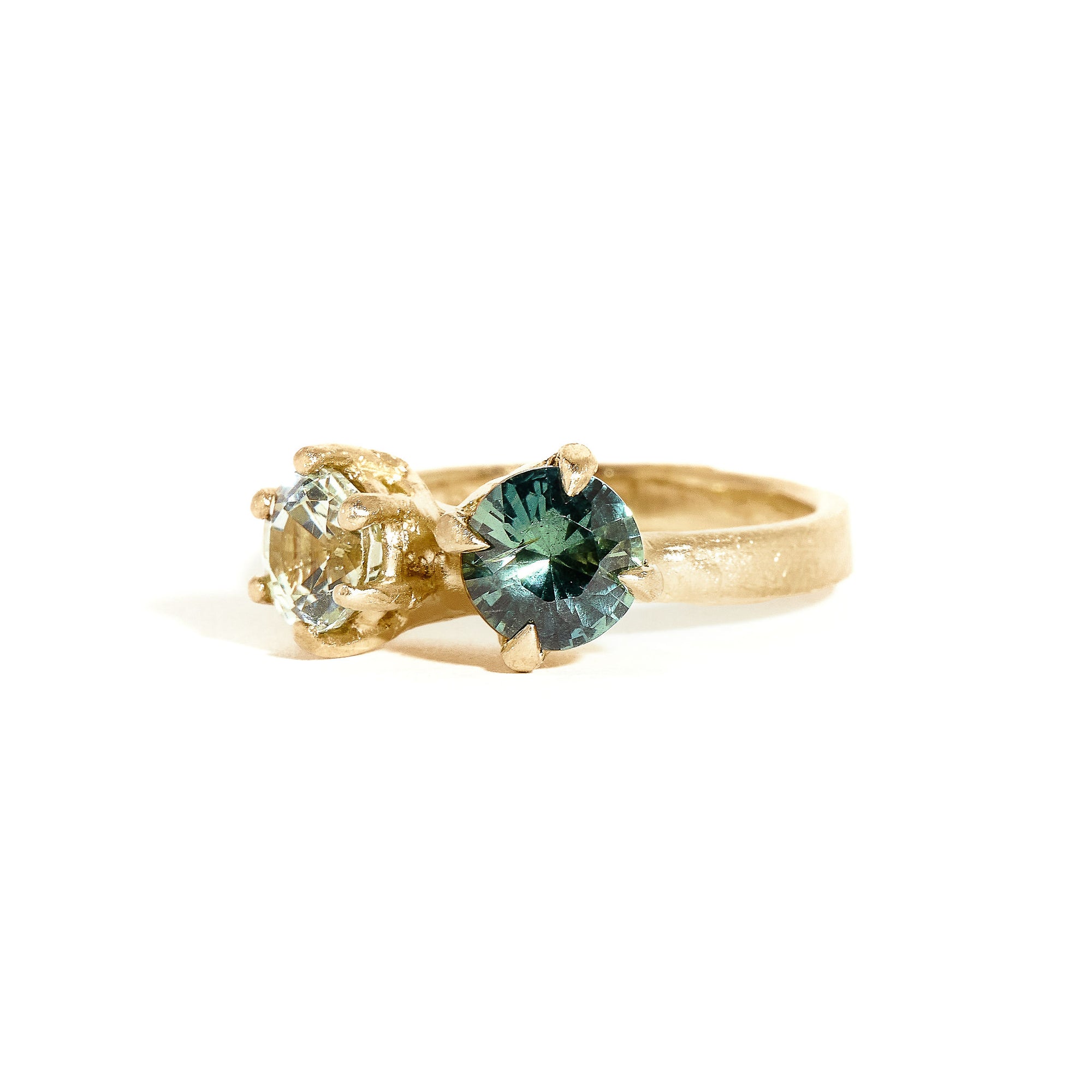 Two stone sapphire ring with light green and teal sapphires in 9ct yellow gold