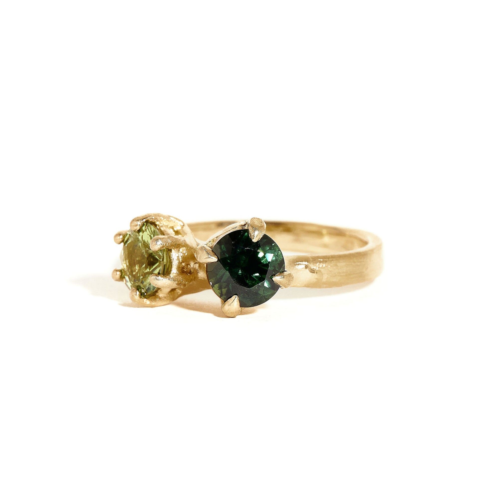Two stone sapphire ring with dark and light green sapphires in 9ct yellow gold