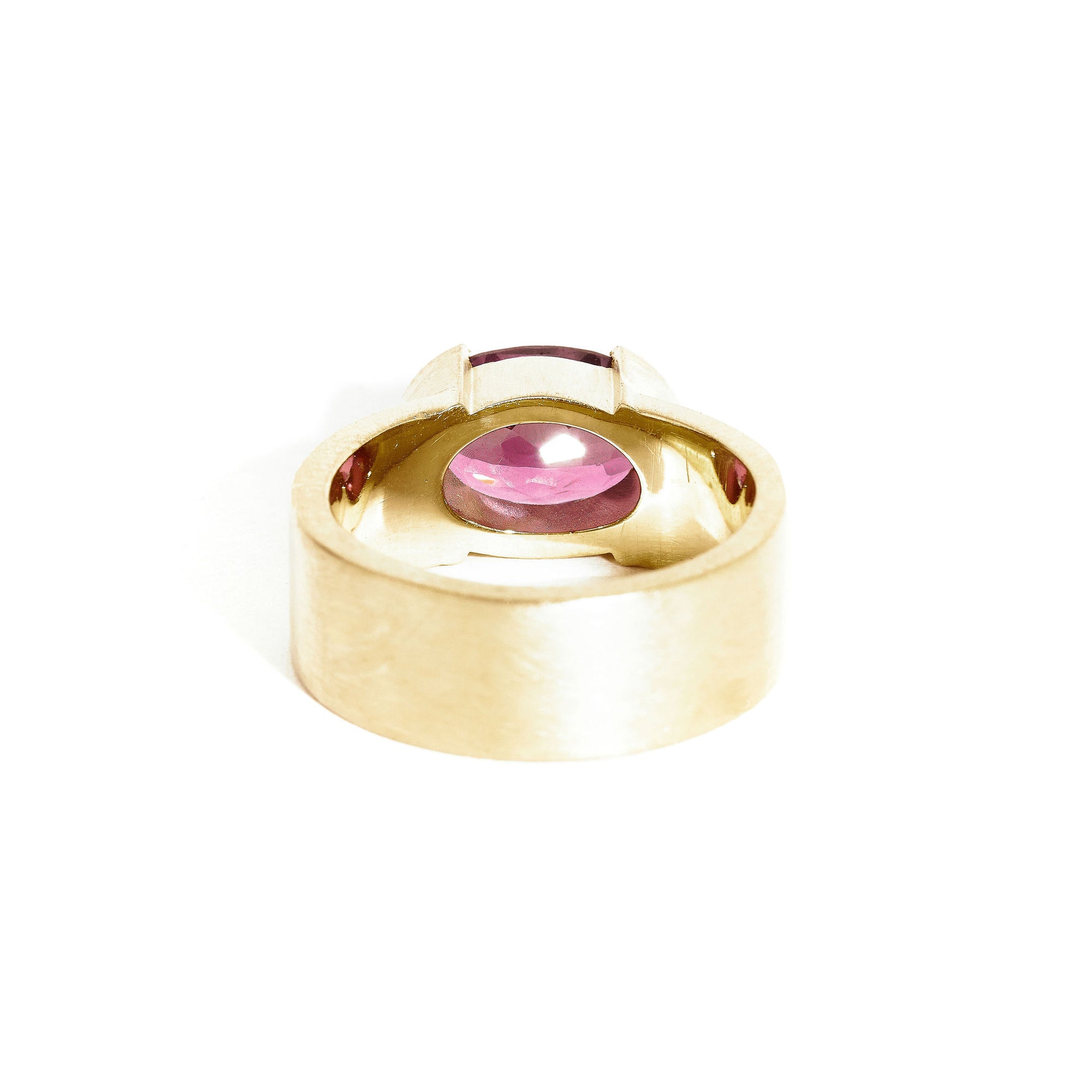 Garnet ring wth 7mm band and partial bezel setting
