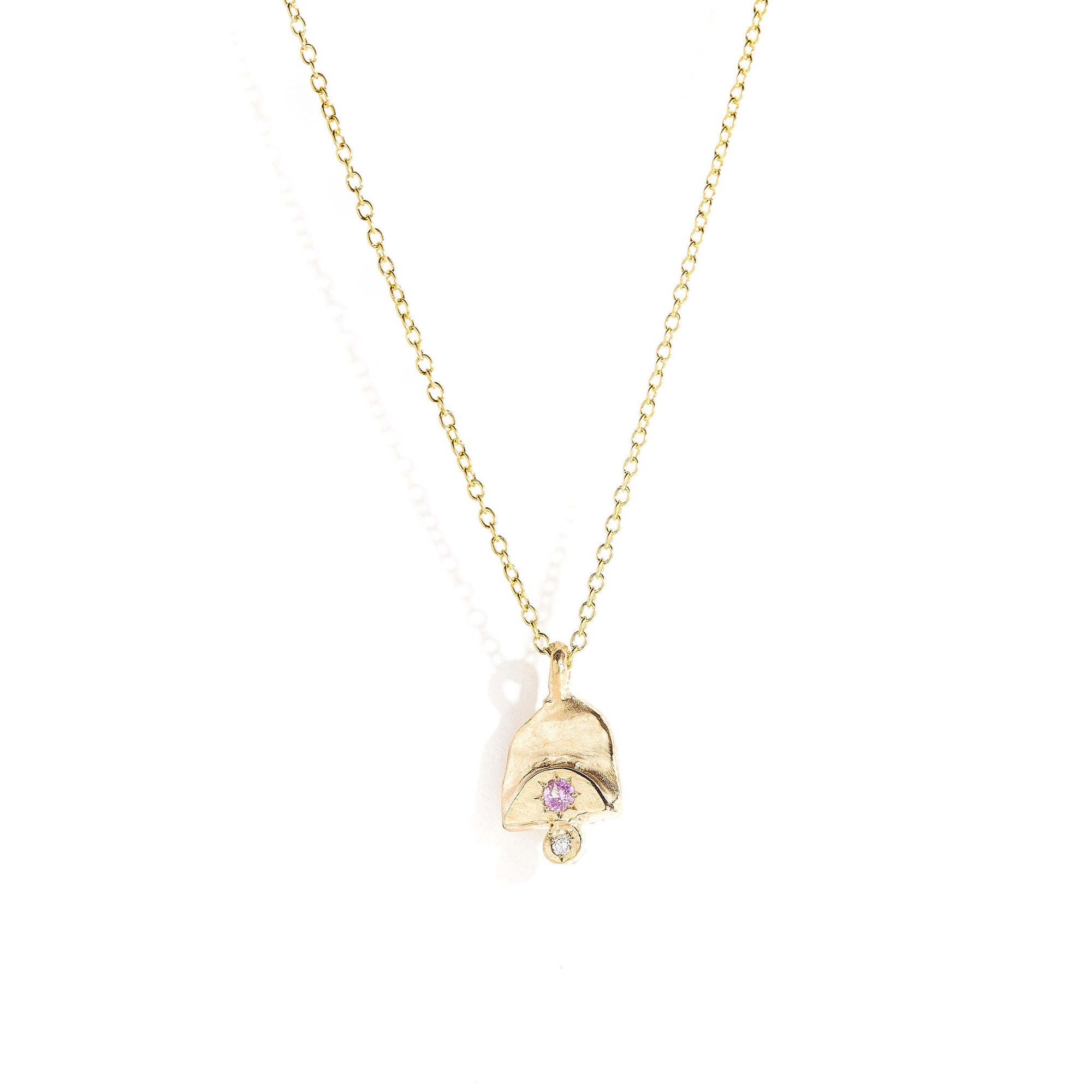 Pink sapphire and white diamond pendant in 9 carat yellow gold. 
