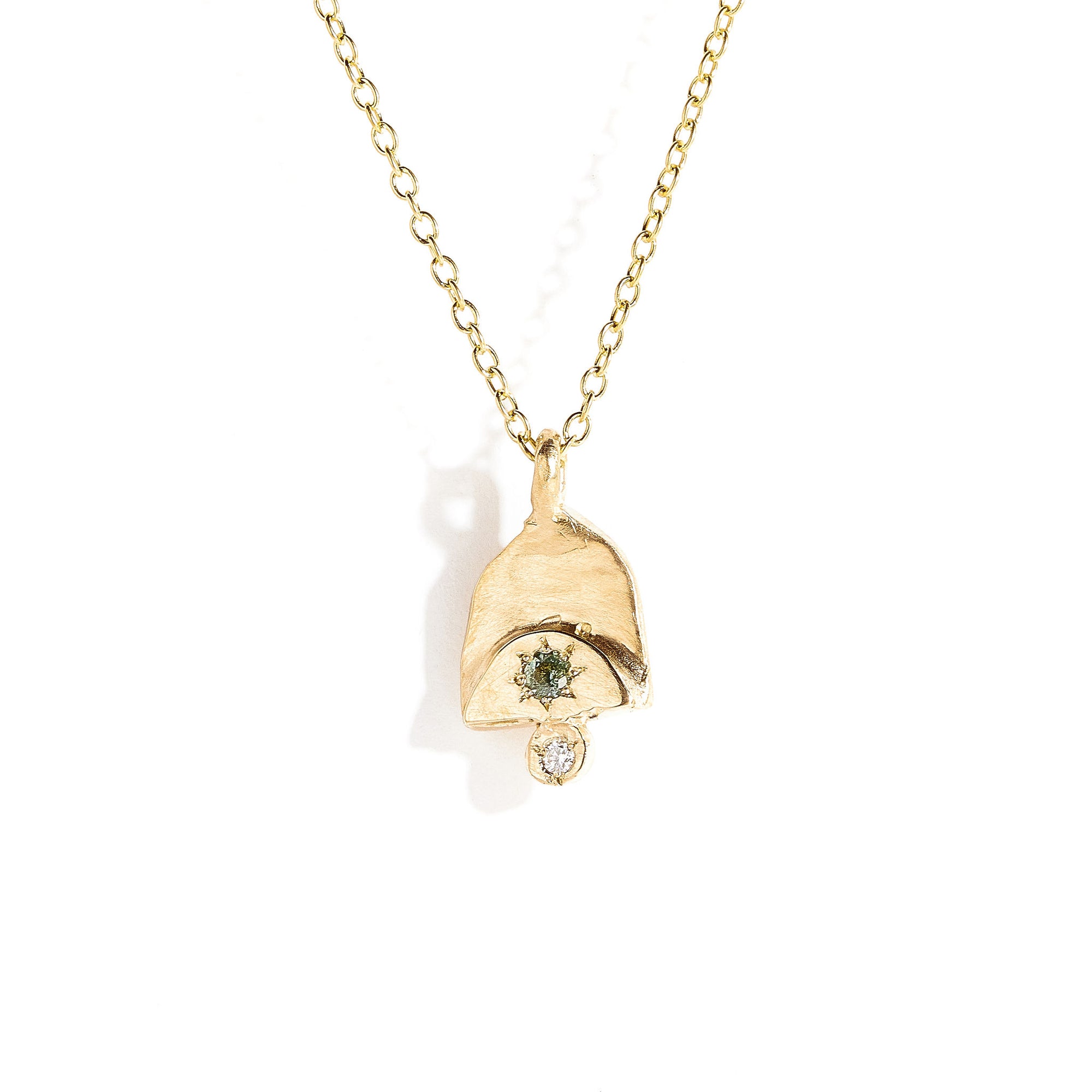 Teal sapphire and white diamond pendant in 9 carat yellow gold. 