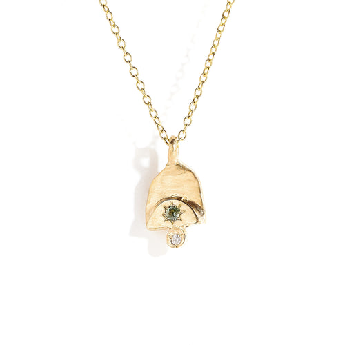 Teal sapphire and white diamond pendant in 9 carat yellow gold. 