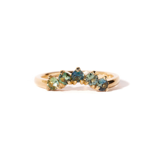 18 carat yellow gold woman's wedding band with 5 round, ethically sourced Australian blue/green parti sapphires, claw set in a slight curve. 
