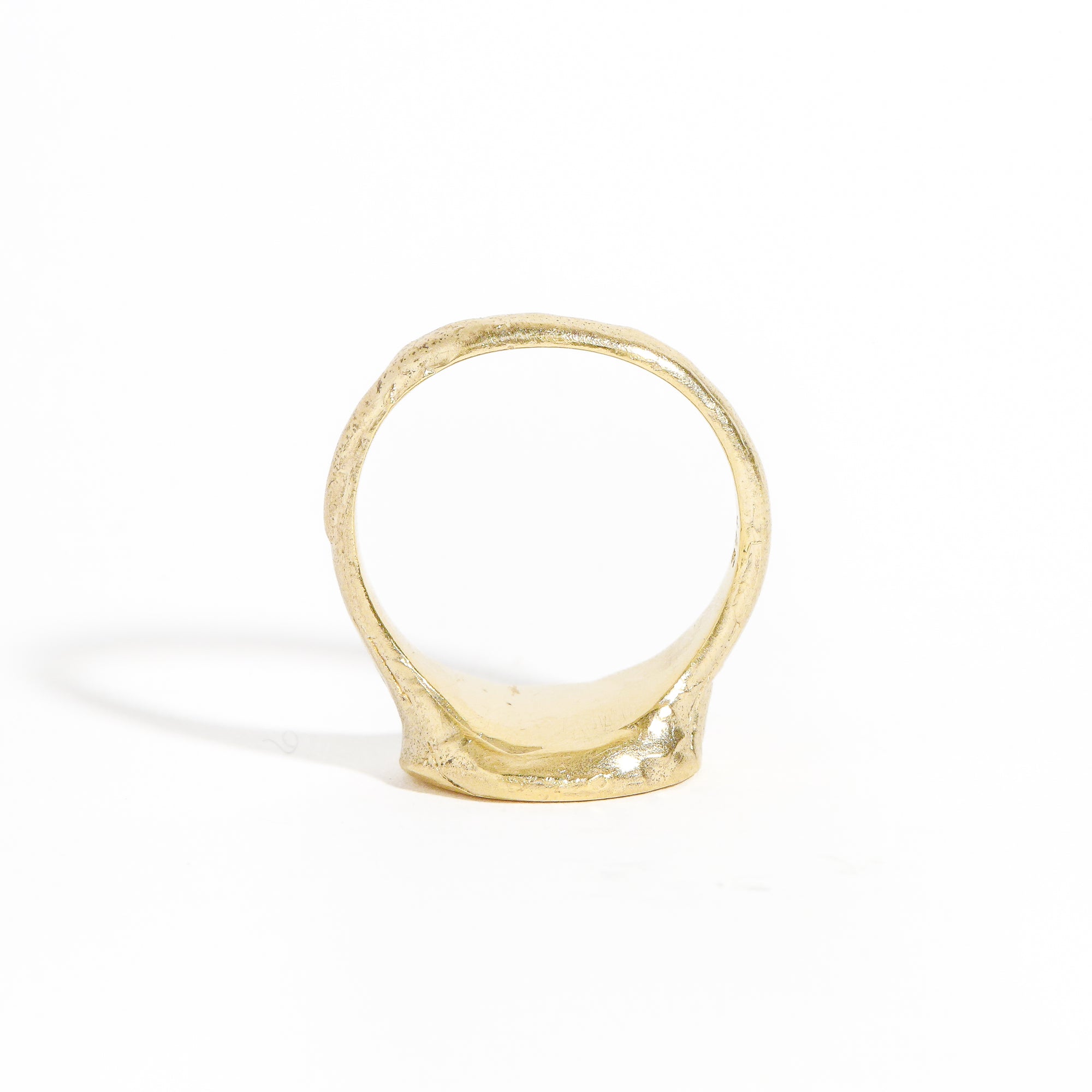 9 carat yellow gold round signet ring with a polished surface and soft matte band.